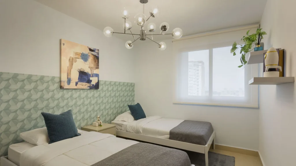 dormitorio dos camas individuales en Spotlight